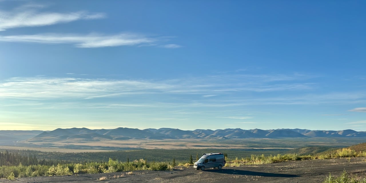 Ultrawide view from a gravel pit campsite just before the Arctic Circle on the Dempster Highway