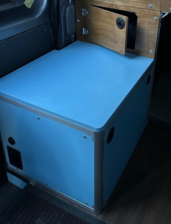 The bench seat by the sliding door