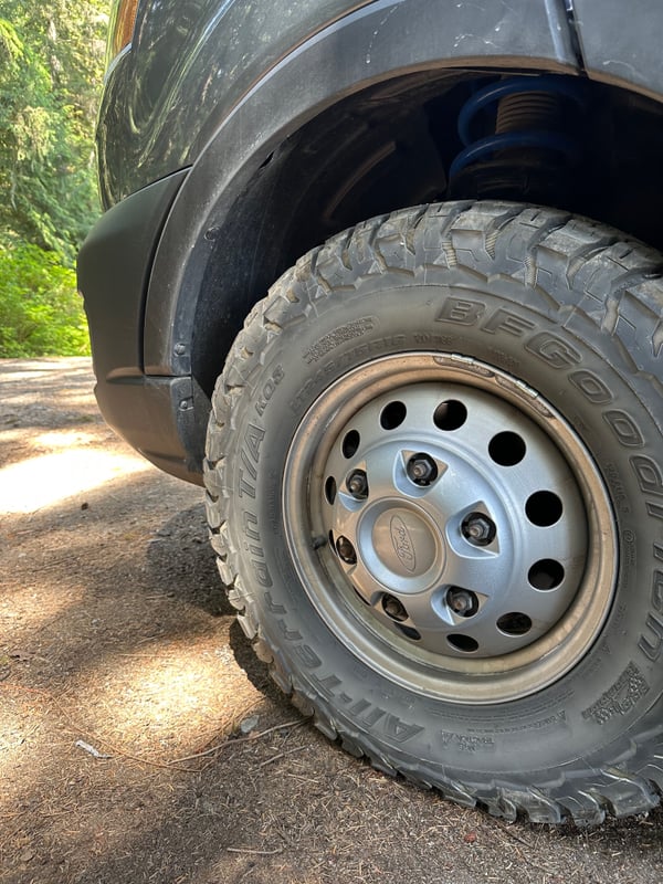 Van Compass suspension lift and all-terrain tires