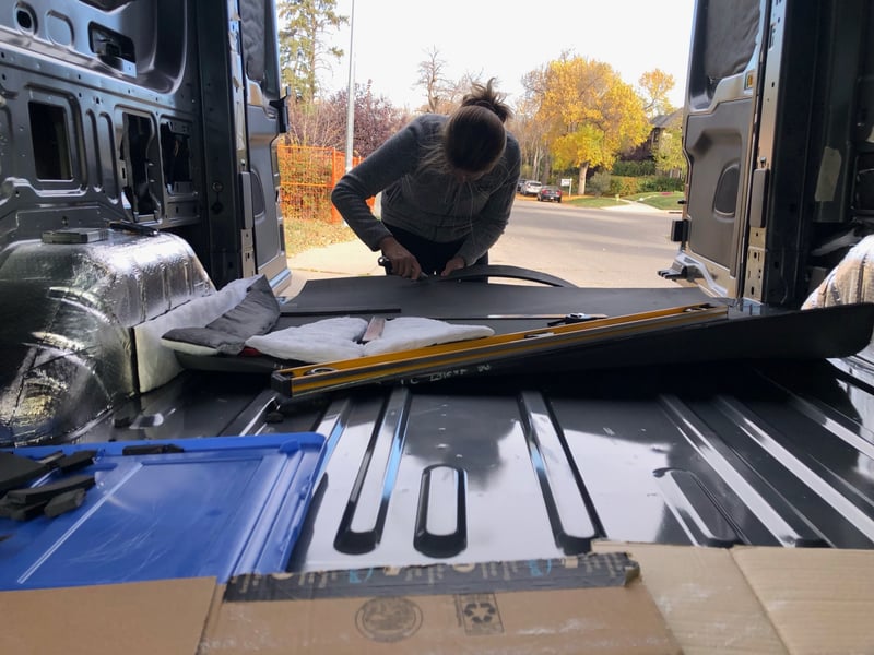 Closed-cell foam insulation filling the Transit floor ribs